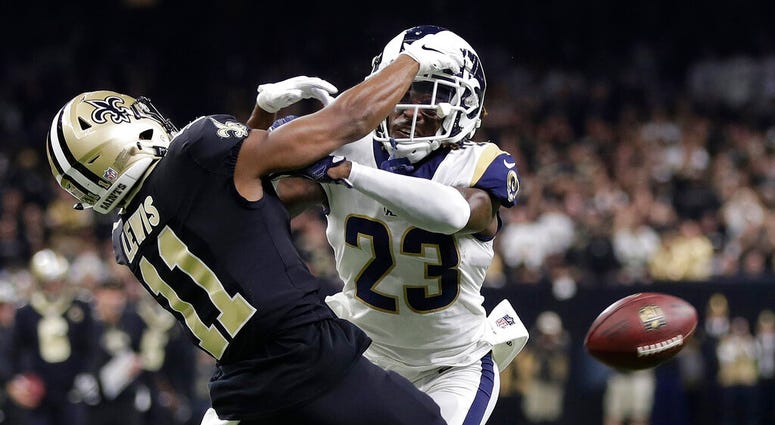 Los Angeles Rams' Nickell Robey-Coleman breaks up a pass intended for New Orleans Saints' Tommylee Lewis Los Angeles Rams' Nickell Robey-Coleman breaks up a pass intended for New Orleans Saints' Tommylee Lewis