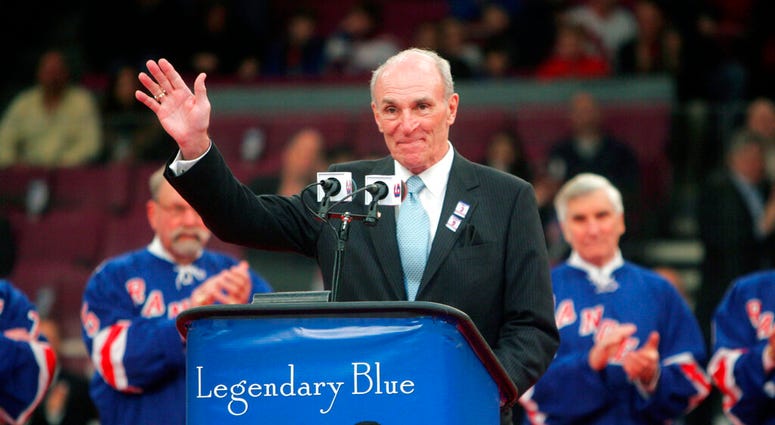Harry Howell waves to the crowd during a ceremony to retire his number before the Ranger's hockey game at Madison Square Garden in New York. Harry Howell waves to the crowd during a ceremony to retire his number before the Ranger's hockey game at Madison Square Garden in New York.