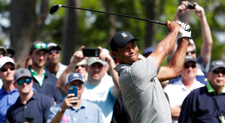 Tiger Woods hits from the seventh tee during a practice round at The Players Championship golf tournament, Wednesday, March 13, 2019, in Ponte Vedra Beach, Fla Tiger Woods hits from the seventh tee during a practice round at The Players Championship golf tournament, Wednesday, March 13, 2019, in Ponte Vedra Beach, Fla