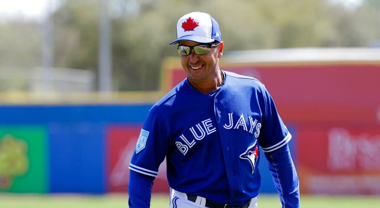 In this Thursday, Feb. 28, 2019, file photo, Toronto Blue Jays manager Charlie Montoyo watches during a spring training baseball game against the Philadelphia Phillies in Dunedin, Fla. AP DO NOT USE