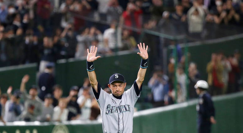 Seattle Mariners right fielder Ichiro Suzuki returns to the field for waiting fans after Game 2 of the Major League baseball opening series against the Oakland Athletics at Tokyo Dome in Tokyo, Thursday, March 21, 2019. AP DO NOT USE