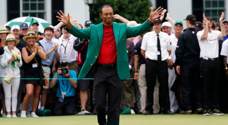 Tiger Woods celebrates after he won the Masters golf tournament Sunday, April 14, 2019, in Augusta, Ga. AP DO NOT USE