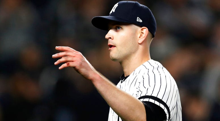 New York Yankees starting pitcher James Paxton waves to the crowd after pitching eight innings in the Yankees' 8-0 win over the Boston Red Sox in a baseball game Tuesday, April 16, 2019, in New York. AP DO NOT USE