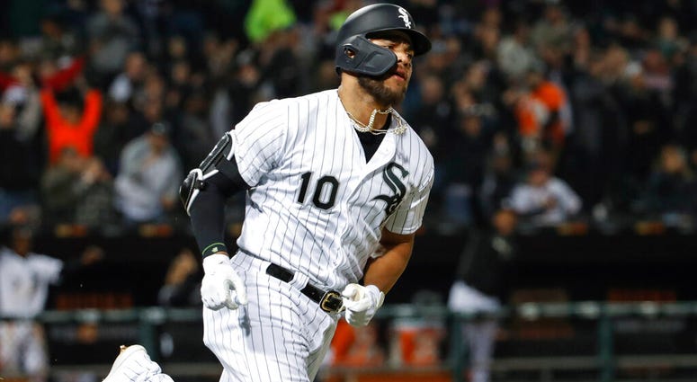 Chicago White Sox's Yoan Moncada rounds the bases after hitting a solo home run off of Kansas City Royals starting pitcher Jorge Lopez during the fifth inning of a baseball game, Tuesday, April 16, 2019, in Chicago. AP DO NOT USE