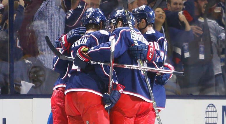 Columbus Blue Jackets players celebrate their goal against the Boston Bruins during the first period of Game 3 of an NHL hockey second-round playoff series Tuesday, April 30, 2019, in Columbus, Ohio. AP DO NOT USE