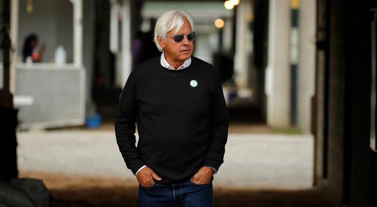 Trainer Bob Baffert looks out from his barn before a workout at Churchill Downs Wednesday, May 1, 2019, in Louisville, Ky. Baffert has three horses competing in the 145th running of the Kentucky Derby which is scheduled for Saturday, May 4 AP DO NOT USE