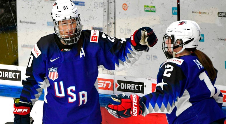 file photo, Team USA's Hilary Knight, left, celebrates a goal with Kelly Pannek, who provided the assist, during a IIHF Women's Ice Hockey World Championships semifinal match against Russia AP DO NOT USE
