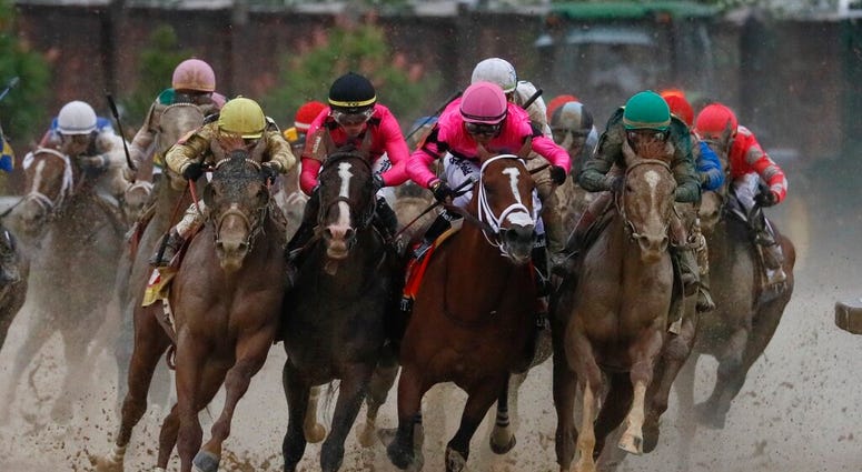 Luis Saez riding Maximum Security, second from right, goes around turn four with Flavien Prat riding Country House, left, Tyler Gaffalione riding War of Will and John Velazquez riding Code of Honor, right, during the 145th running of the Kentucky Derby ho Luis Saez riding Maximum Security, second from right, goes around turn four with Flavien Prat riding Country House, left, Tyler Gaffalione riding War of Will and John Velazquez riding Code of Honor, right, during the 145th running of the Kentucky Derby ho