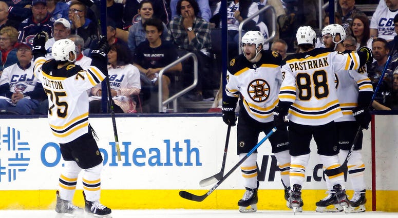Boston Bruins players celebrate their goal against the Columbus Blue Jackets during the second period of Game 6 of an NHL hockey second-round playoff series Monday, May 6, 2019, in Columbus, Ohio. AP DO NOT USE