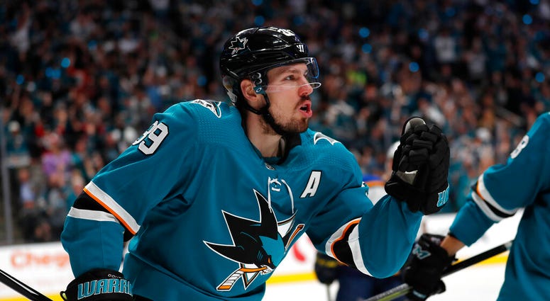 San Jose Sharks' Logan Couture (39) celebrates after scoring a goal against the St. Louis Blues in the first period in Game 1 of the NHL hockey Stanley Cup Western Conference finals in San Jose, Calif., on SaSan Jose Sharks' Logan Couture (39) celebrates AP DO NOT USE