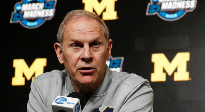 In this March 27, 2019 file photo Michigan head coach John Beilein speaks during a news conference at the NCAA college basketball tournament in Anaheim, Calif. ap do not use