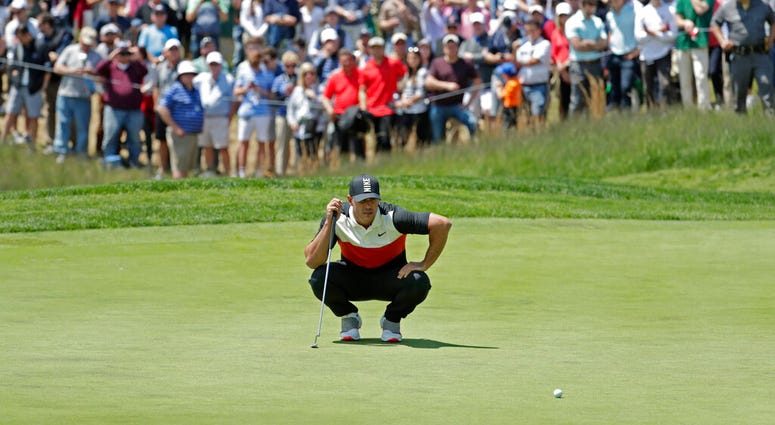Brooks Koepka lines up a putt on the fifth green during the first round of the PGA Championship golf tournament, Thursday, May 16, 2019, at Bethpage Black in Farmingdale, N.Y. Brooks Koepka lines up a putt on the fifth green during the first round of the PGA Championship golf tournament, Thursday, May 16, 2019, at Bethpage Black in Farmingdale, N.Y.