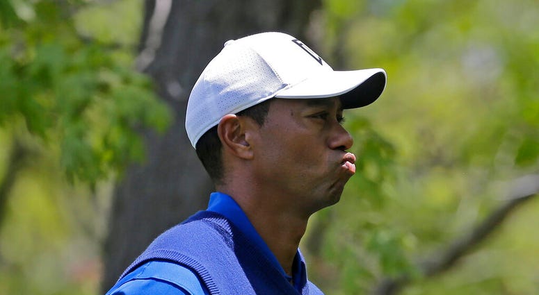 Tiger Woods reacts on the eighth hole during the first round of the PGA Championship golf tournament, Thursday, May 16, 2019, at Bethpage Black in Farmingdale, N.Y. Tiger Woods reacts on the eighth hole during the first round of the PGA Championship golf tournament, Thursday, May 16, 2019, at Bethpage Black in Farmingdale, N.Y.