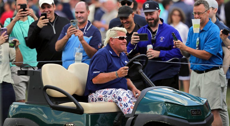 John Daly drives to the 10th tee in a golf cart during the first round of the PGA Championship golf tournament, Thursday, May 16, 2019, at Bethpage Black in Farmingdale, N.Y. John Daly drives to the 10th tee in a golf cart during the first round of the PGA Championship golf tournament, Thursday, May 16, 2019, at Bethpage Black in Farmingdale, N.Y.