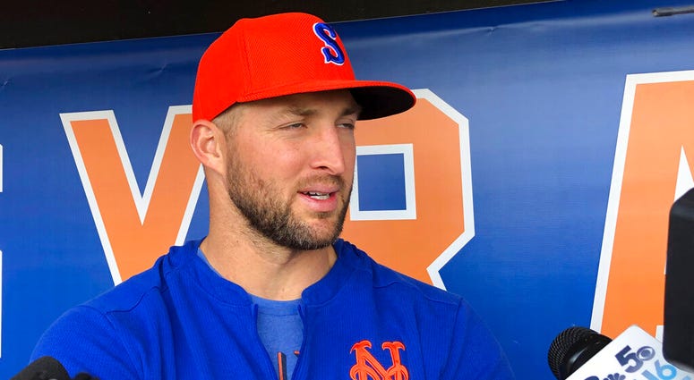 Syracuse Mets' Tim Tebow speaks with reporters prior to a minor league baseball game, Thursday, May 16, 2019 in Syracuse, N.Y. AP DO NOT USE