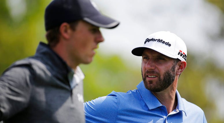 Dustin Johnson, right, and Jordan Spieth prepare to hit off the third tee during the second round of the PGA Championship golf tournament, Friday, May 17, 2019, at Bethpage Black in Farmingdale, N.Y. AP DO NO TUSE