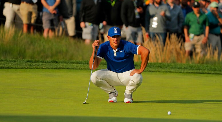 Brooks Koepka lines up a putt on the 17th green during the second round of the PGA Championship golf tournament, Friday, May 17, 2019, at Bethpage Black in Farmingdale, N.Y. Brooks Koepka lines up a putt on the 17th green during the second round of the PGA Championship golf tournament, Friday, May 17, 2019, at Bethpage Black in Farmingdale, N.Y.
