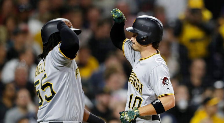 Pittsburgh Pirates' Bryan Reynolds, right, is greeted by Josh Bell after hitting a two-run home run during the fourth inning of the team's baseball game against the San Diego Padres, Friday, May 17, 2019, in San Diego. Pittsburgh Pirates' Bryan Reynolds, right, is greeted by Josh Bell after hitting a two-run home run during the fourth inning of the team's baseball game against the San Diego Padres, Friday, May 17, 2019, in San Diego.