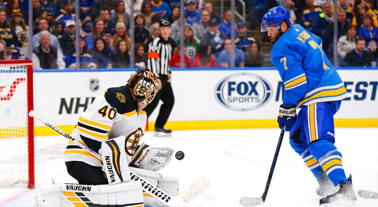 In this Feb. 23, 2019, file photo, Boston Bruins goalie Tuukka Rask (40), of Finland, makes a save against St. Louis Blues' Patrick Maroon (7) during the second period of an NHL hockey game, in St. Louis AP DO NOT USE