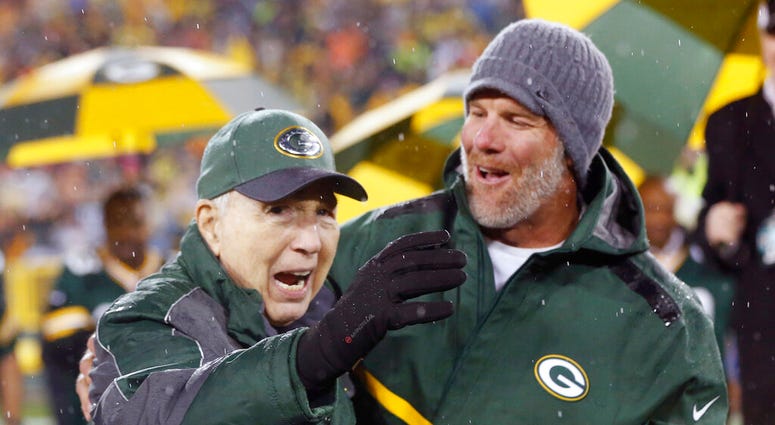 Brett Favre, right, smiles at Bart Starr during a ceremony at halftime of an NFL football game Brett Favre, right, smiles at Bart Starr during a ceremony at halftime of an NFL football game