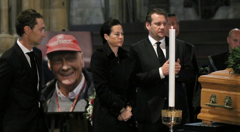 Birgit Lauda, center, widow of the former formular Formula One driver Niki Lauda, attends a funeral service for Lauda in Vienna, Austria, Wednesday, May 29, 2019. AP DO NOT USE
