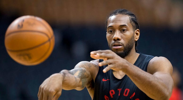 Toronto Raptors' Kawhi Leonard passes during practice for the NBA Finals in Toronto on Wednesday, May 29, 2019. Game 1 of the NBA Finals between the Raptors and Golden State Warriors is Thursday in Toronto Toronto Raptors' Kawhi Leonard passes during practice for the NBA Finals in Toronto on Wednesday, May 29, 2019. Game 1 of the NBA Finals between the Raptors and Golden State Warriors is Thursday in Toronto