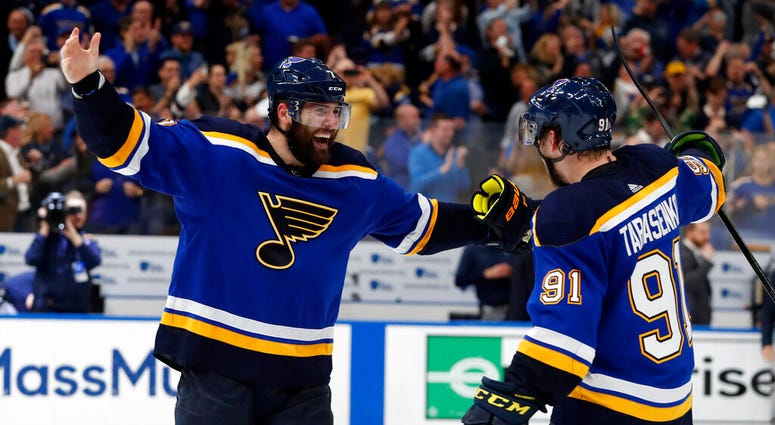 St. Louis Blues center Ryan O'Reilly (90) celebrates with David Perron (57) after O'Reilly scored his second goal of the game AP DO NOT USE