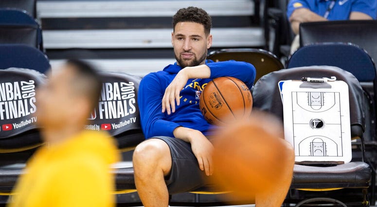 Golden State Warriors' Klay Thompson sits on the bench watching teammates during practice for the NBA Finals against the Toronto Raptors Tuesday, June 4, 2019, in Oakland, Calif. Game 3 of the NBA Finals is Wednesday, June 5, 2019, in Oakland, Calif. Golden State Warriors' Klay Thompson sits on the bench watching teammates during practice for the NBA Finals against the Toronto Raptors Tuesday, June 4, 2019, in Oakland, Calif. Game 3 of the NBA Finals is Wednesday, June 5, 2019, in Oakland, Calif.