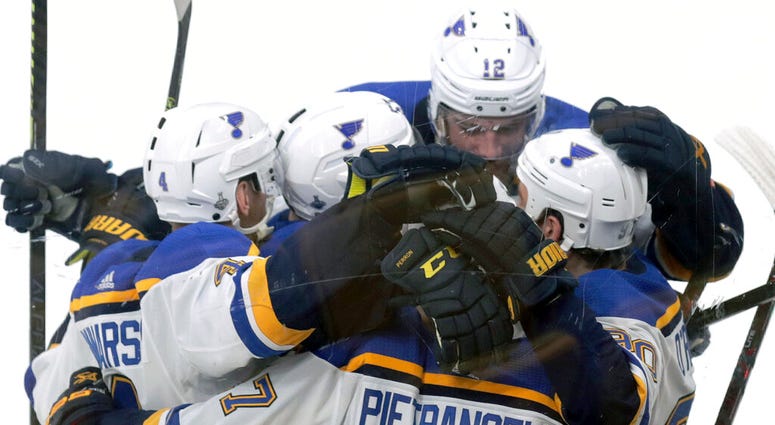 St. Louis Blues' Ryan O'Reilly, right, celebrates his goal against the Boston Bruins with teammates during the second period in Game 5 of the NHL hockey Stanley Cup Final, Thursday, June 6, 2019, in Boston. St. Louis Blues' Ryan O'Reilly, right, celebrates his goal against the Boston Bruins with teammates during the second period in Game 5 of the NHL hockey Stanley Cup Final, Thursday, June 6, 2019, in Boston.