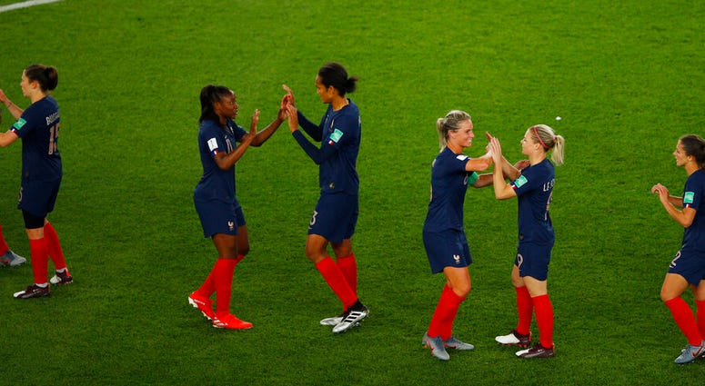 France players celebrate at the end of the Women's World Cup Group A soccer match between France and South Korea at the Parc des Princes in Paris, Friday, June 7, 2019. France won 4-0. France players celebrate at the end of the Women's World Cup Group A soccer match between France and South Korea at the Parc des Princes in Paris, Friday, June 7, 2019. France won 4-0.
