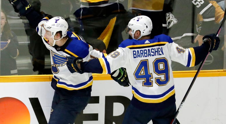 St. Louis Blues right wing Vladimir Tarasenko, of Russia, left, celebrates with Ivan Barbashev (49), of Russia St. Louis Blues right wing Vladimir Tarasenko, of Russia, left, celebrates with Ivan Barbashev (49), of Russia