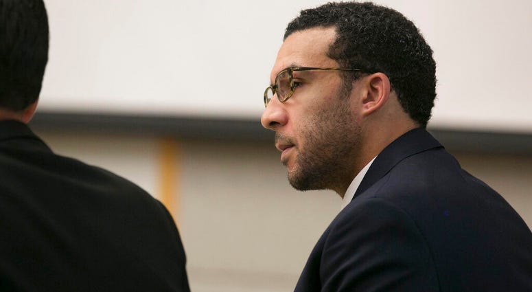 In this May 20, 2019, file photo, former NFL football player Kellen Winslow Jr. looks at attorney Marc Carlos during his rape trial in Vista, Calif. T AP DO NOT USE