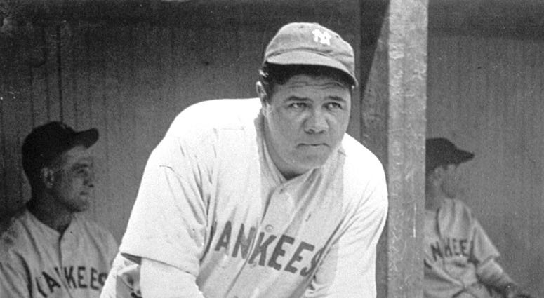 New York Yankees' Babe Ruth, who was injured, stands in the dugout during the baseball team's game at Cleveland New York Yankees' Babe Ruth, who was injured, stands in the dugout during the baseball team's game at Cleveland