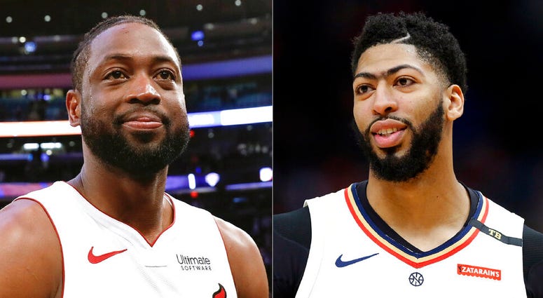 Miami Heat guard Dwyane Wade and New Orleans Pelicans forward Anthony Davis Miami Heat guard Dwyane Wade and New Orleans Pelicans forward Anthony Davis