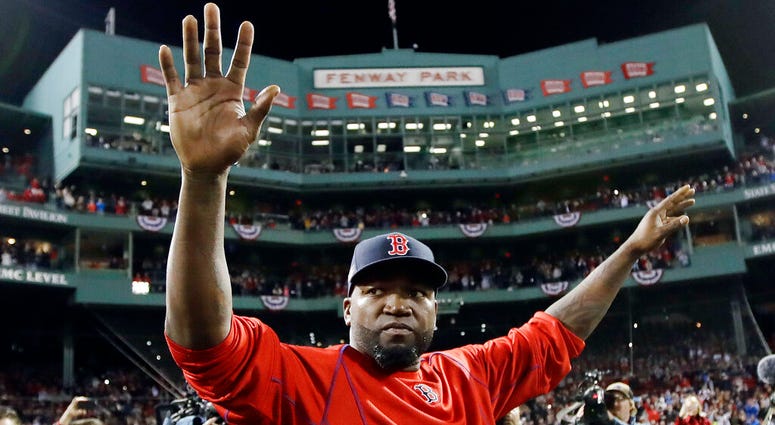 Boston Red Sox's David Ortiz waves from the field at Fenway Park after Game 3 of baseball's American League Division Series against the Cleveland Indians in Bosto AP DO NOT USE