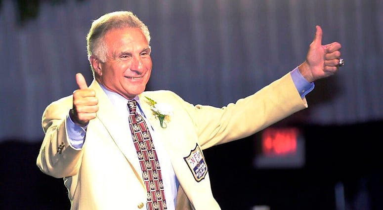 Nick Buoniconti, former Boston Patriots and Miami Dolphins linebacker, gives two thumbs up while being introduced at the Pro Football Hall of Fame Nick Buoniconti, former Boston Patriots and Miami Dolphins linebacker, gives two thumbs up while being introduced at the Pro Football Hall of Fame