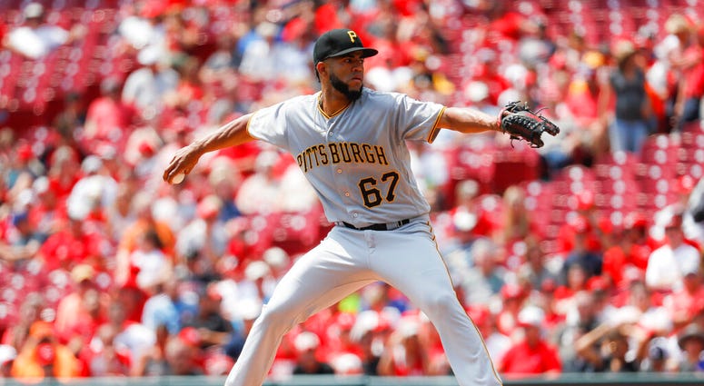 Pittsburgh Pirates starting pitcher Dario Agrazal throws in the first inning of a baseball game against the Cincinnati Reds, Wednesday, July 31, 2019, in Cincinnati. Pittsburgh Pirates starting pitcher Dario Agrazal throws in the first inning of a baseball game against the Cincinnati Reds, Wednesday, July 31, 2019, in Cincinnati.