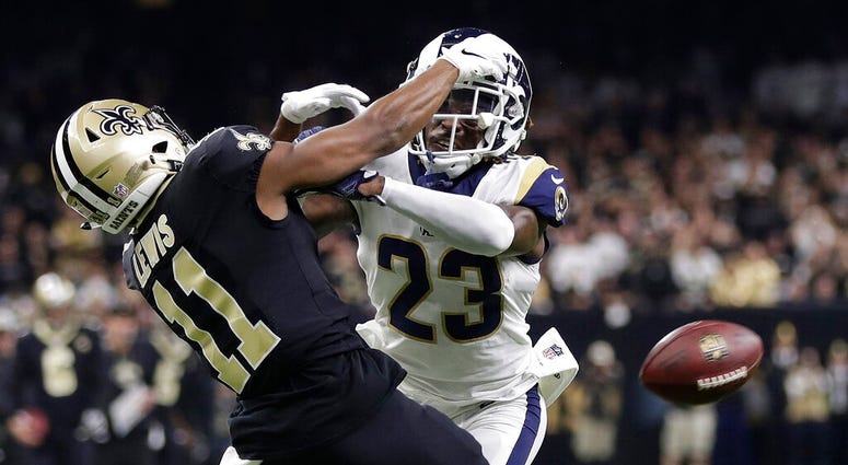 Los Angeles Rams' Nickell Robey-Coleman breaks up a pass intended for New Orleans Saints' Tommylee Lewis Los Angeles Rams' Nickell Robey-Coleman breaks up a pass intended for New Orleans Saints' Tommylee Lewis