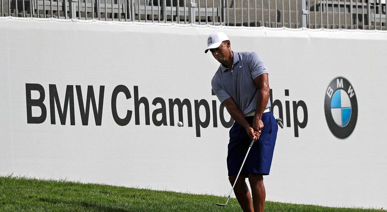 Tiger Woods chips an approach shot on the 12th hole during the pro-am round of the BMW Championship golf tournament at Medinah Country Club, Wednesday, Aug. 14, 2019, in Medinah, Ill. Tiger Woods chips an approach shot on the 12th hole during the pro-am round of the BMW Championship golf tournament at Medinah Country Club, Wednesday, Aug. 14, 2019, in Medinah, Ill.