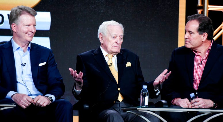 FILE - In this Jan. 12, 2016, file photo, from left to right, sportscasters Phil Simms, Jack Whitaker and Jim Nantz participate in the "CBS Sports" panel at the CBS 2016 Winter TCA in Pasadena, Calif. AP DO NO TUSE