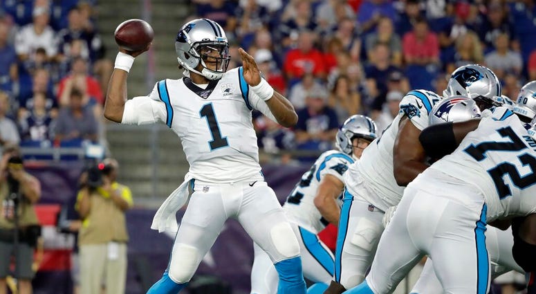Carolina Panthers quarterback Cam Newton drops back to pass against the New England Patriots in the first quarter of an NFL preseason football game, Thursday, Aug. 22, 2019, in Foxborough, Mass. Carolina Panthers quarterback Cam Newton drops back to pass against the New England Patriots in the first quarter of an NFL preseason football game, Thursday, Aug. 22, 2019, in Foxborough, Mass.