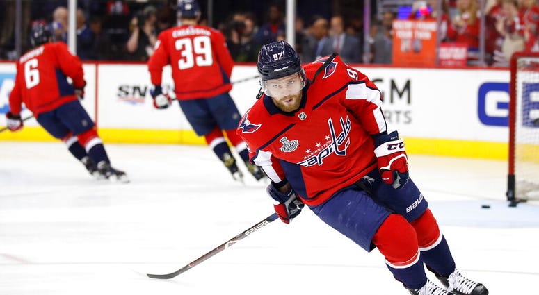 In this Saturday, June 2, 2018 file photo, Washington Capitals forward Evgeny Kuznetsov, of Russia, warms up before Game 3 of the team's NHL hockey Stanley Cup