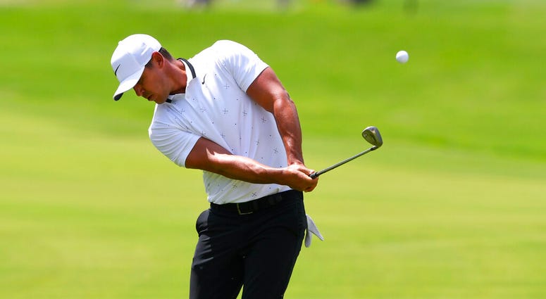 Brooks Koepka chips to the fourth green during the first round of the Tour Championship golf tournament Friday, Aug. 23, 2019, in Atlanta. Brooks Koepka chips to the fourth green during the first round of the Tour Championship golf tournament Friday, Aug. 23, 2019, in Atlanta.