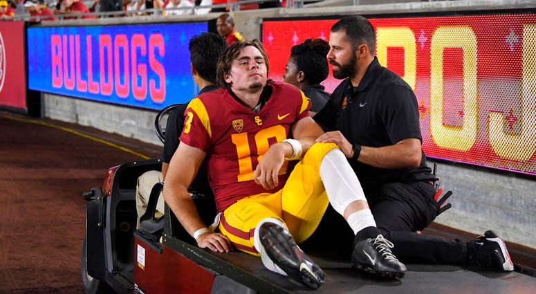 Southern California quarterback JT Daniels is carted off the field after being injured during the first half of an NCAA college football game against Fresno State Saturday, Aug. 31, 2019, in Los Angeles. Southern California quarterback JT Daniels is carted off the field after being injured during the first half of an NCAA college football game against Fresno State Saturday, Aug. 31, 2019, in Los Angeles.