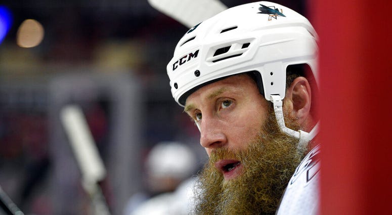 In this Dec. 4, 2017, file photo, San Jose Sharks center Joe Thornton (19) looks on from the bench during the first period of an NHL hockey game against the Washington Capitals in Washington. AP DO NOT USE