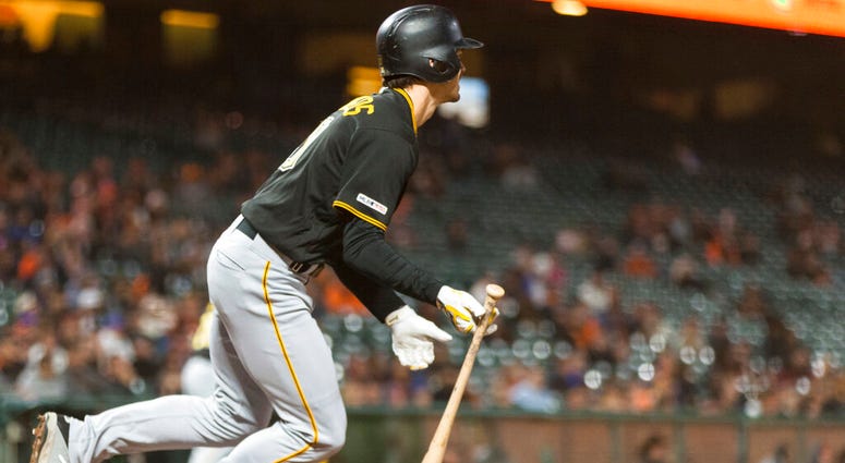 Pittsburgh Pirates' Bryan Reynolds hits a RBI single for the go-ahead run against the San Francisco Giants in the ninth inning of a baseball game in San Francisco, Monday, Sept. 9, 2019. AP DO NOT USE