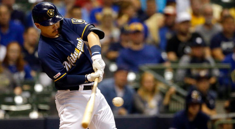 Milwaukee Brewers' Keston Hiura hits a two-run home run during the first inning of a baseball game against the Pittsburgh Pirates, Saturday, Sept. 21, 2019, in Milwaukee AP DO NOTUSE