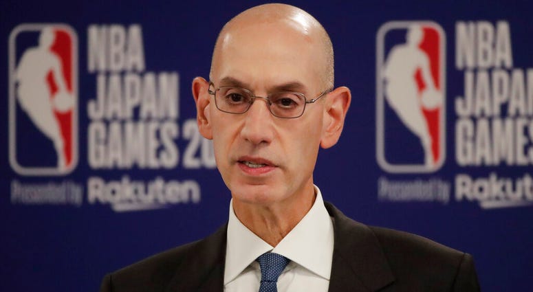 In this Oct. 8, 2019 file photo, NBA Commissioner Adam Silver speaks at a news conference before an NBA preseason basketball game between the Houston Rockets and the Toronto Raptors in Saitama, near Tokyo. ap do not use