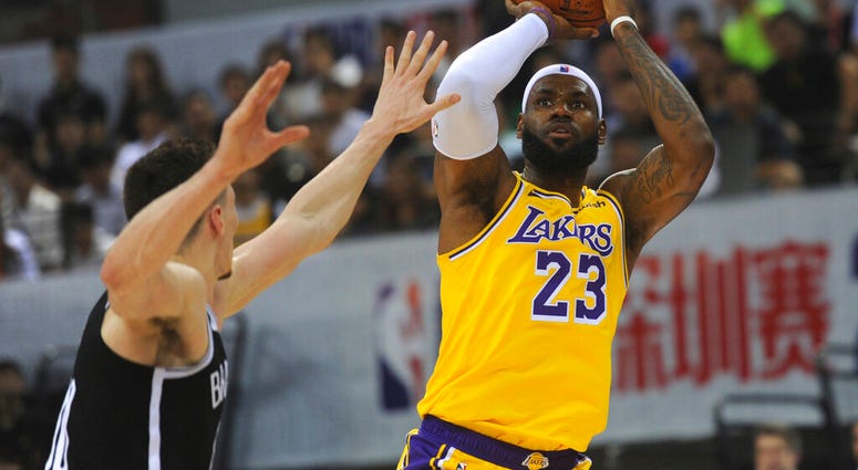 Los Angeles Lakers' LeBron James in action during a match against Brooklyn Nets at the NBA China Games 2019 in Shenzhen in south China's Guangdong province on Saturday, Oct. 12, 2019 (Color China Photo via AP) AP DO NOT USE