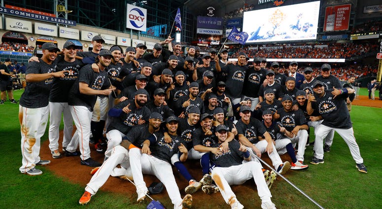 Houston Astros pose after winning Game 6 of baseball's American League Championship Series against the New York Yankees Saturday, Oct. 19, 2019, in Houston. The Astros won 6-4 to win the series 4-2. Houston Astros pose after winning Game 6 of baseball's American League Championship Series against the New York Yankees Saturday, Oct. 19, 2019, in Houston. The Astros won 6-4 to win the series 4-2.